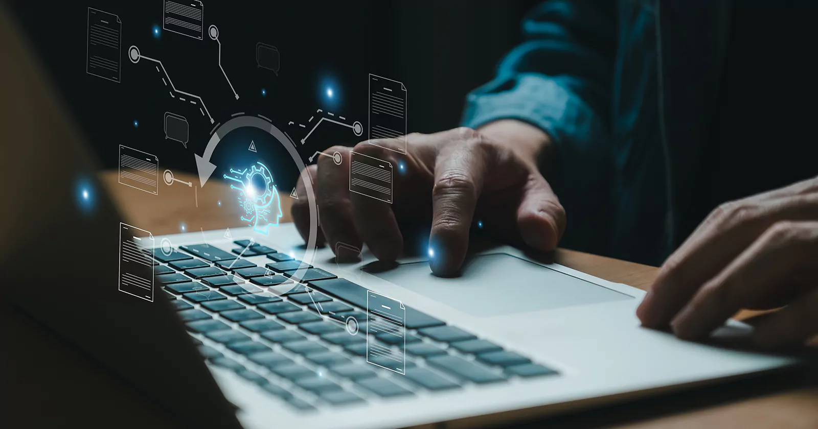 Person working on a laptop with digital data and AI graphics, symbolizing the impact of automation and data overload on SEO strategies in crisis.